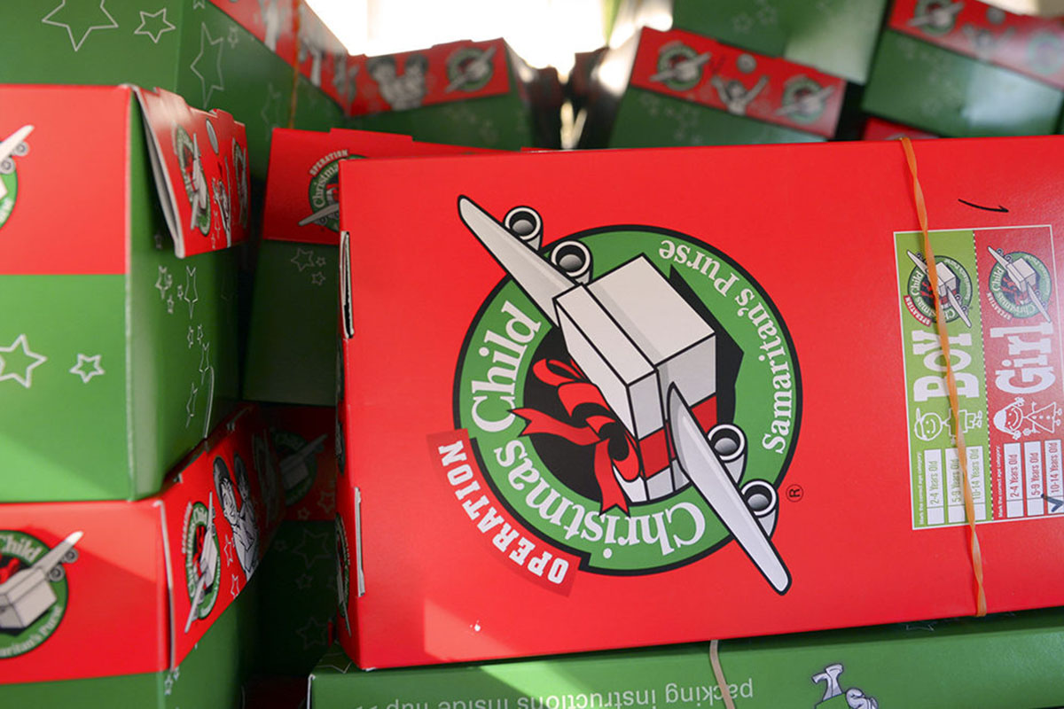 Gifts stacked in a van await delivery to children around the world at Yokota Air Base, Japan, Nov. 17, 2016. Since 1993, more than 100 million box gifts have been delivered to children in more than 130 countries through Operation Christmas Child. (U.S. Air Force photo by Airman 1st Class Elizabeth Baker/Released)